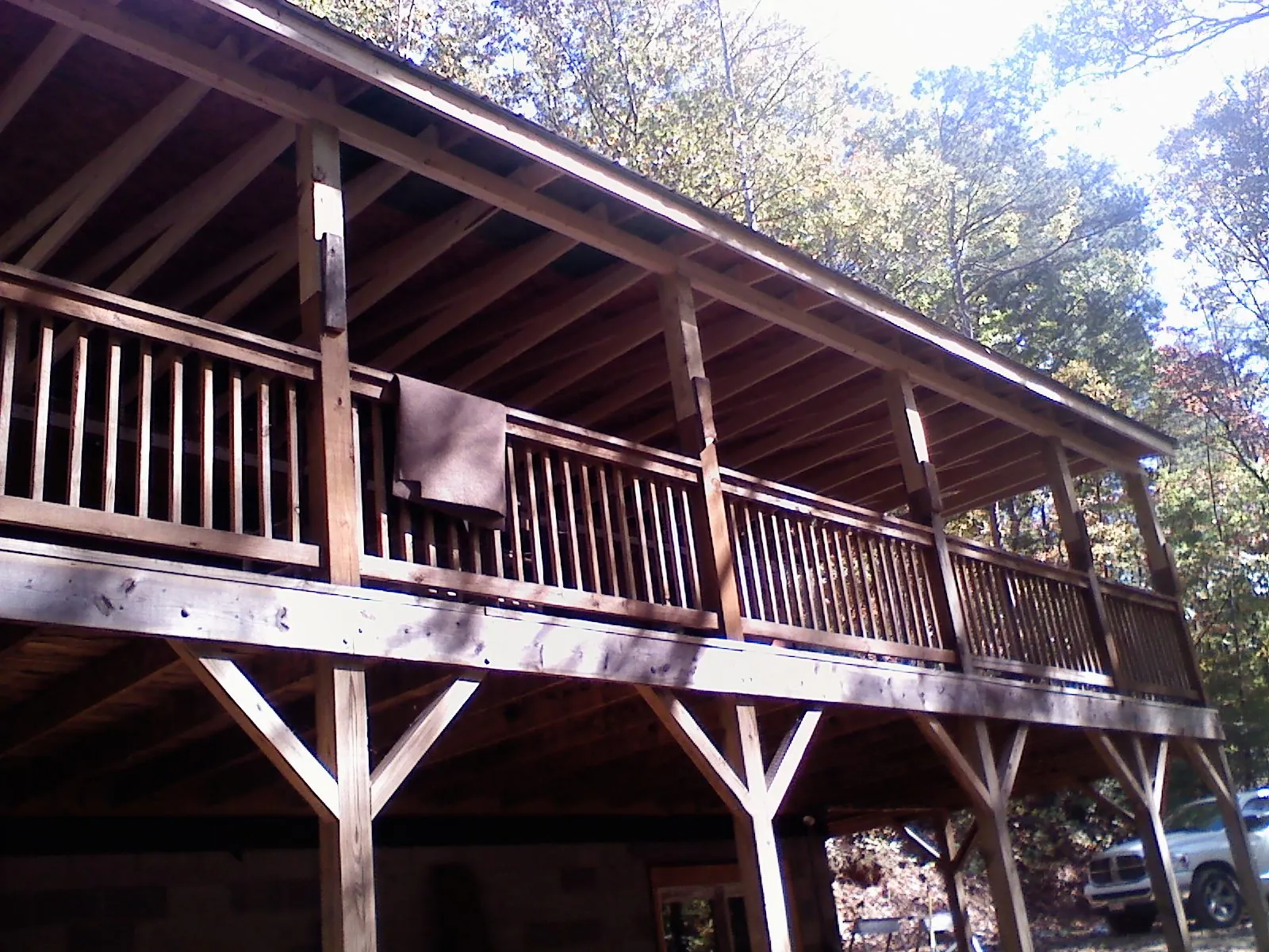 Timber framing under a new elevated porch and deck — Roof Leak Repair in Yakima by Roofing Brothers